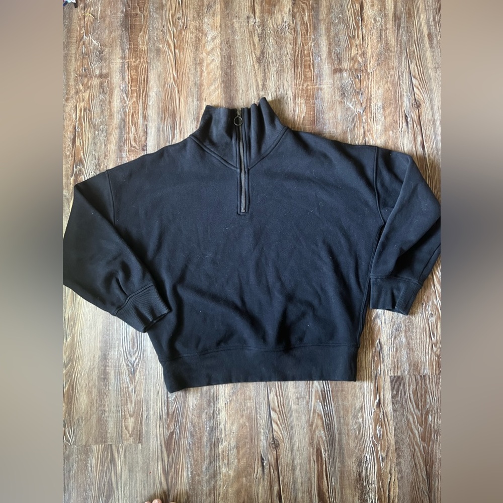 Athlete half zip up black sweater